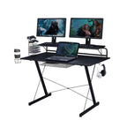 Bureau d'ordinateur gaming en carbone avec étagères